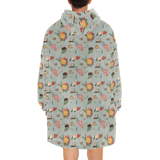 Adorable insect patterns on a cozy fleece hooded blanket