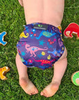 A washable eco friendly nappy in dinosaur print