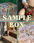Collage of various patterned cloth diapers with text 'SAMPLE BOX' in the center.