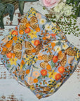 Green Cheeks Cloth Hemp Reusable Nappy in a vintage inspired floral print with butterflies