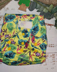Green Cheeks Cloth Hemp Reusable Nappy in yellow with parrots and tropical birds