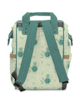 Green Baby Changing Backpack Bag - Turtle Recall - Green Cheeks - Diaper Bag