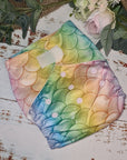 A snapshot of cloth diapers with hemp boosters, an environmentally conscious diapering solution in a colourful mermaid print