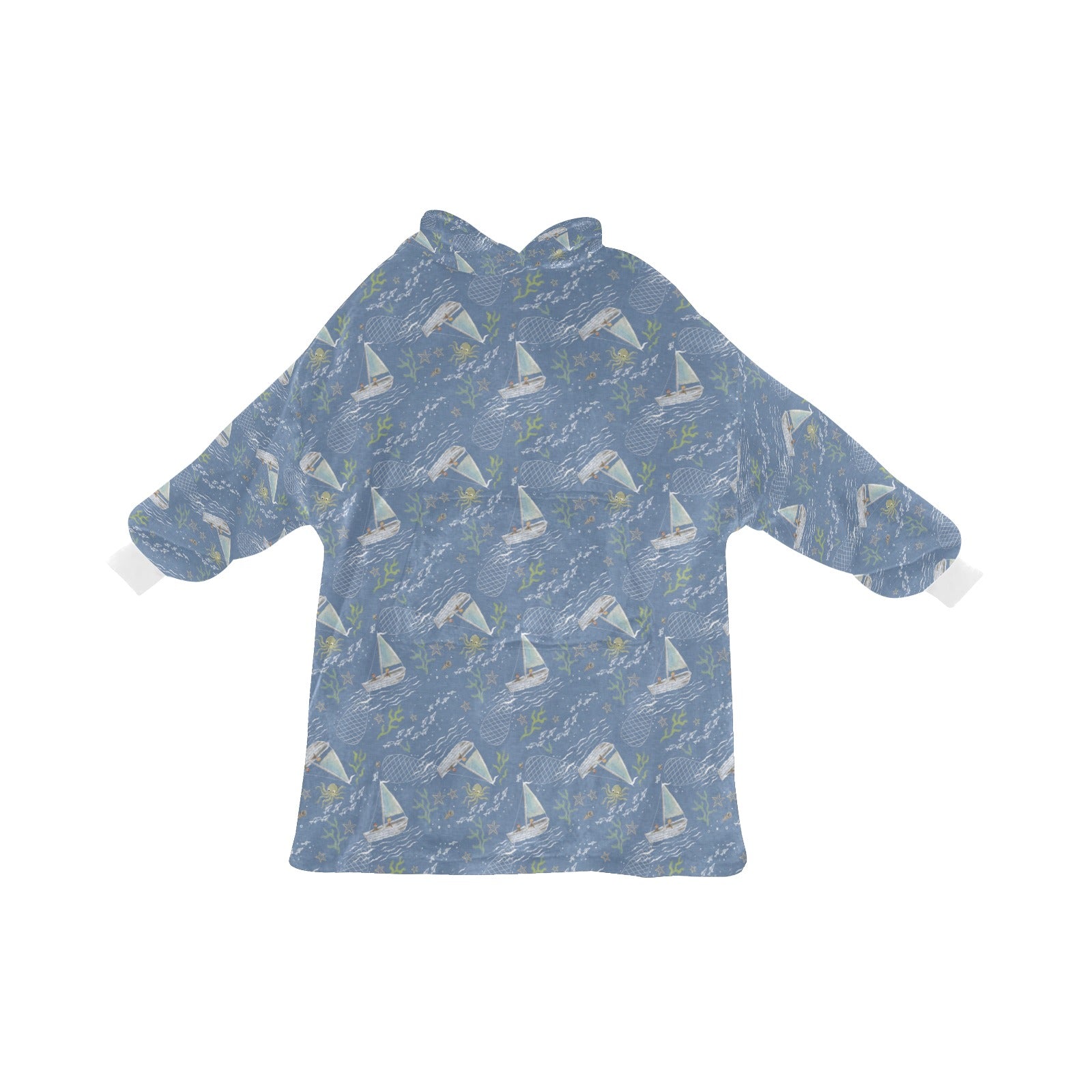 An Oodie-style hooded blanket with a charming blue boats print, designed to keep you warm and stylish on chilly days.
