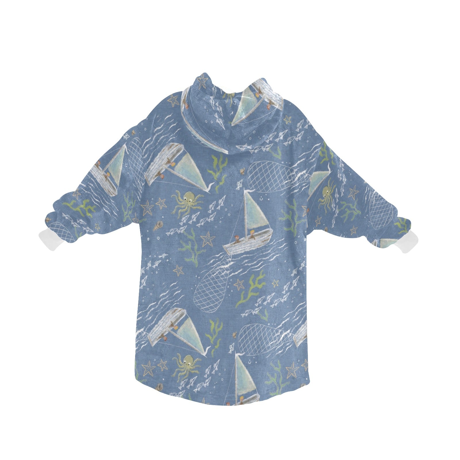 An Oodie-style hooded blanket with a charming blue boats print, designed to keep you warm and stylish on chilly days.