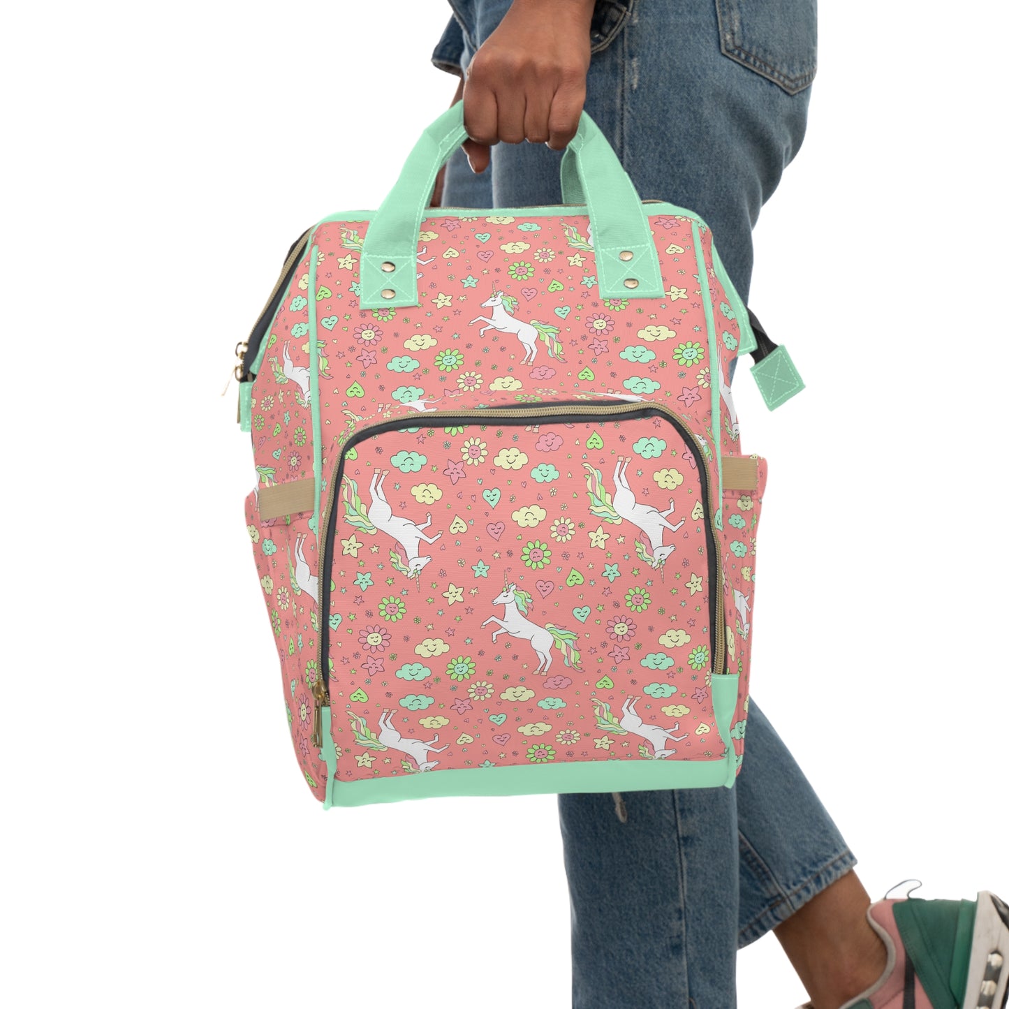 Pink unicorn-themed baby changing backpack, perfect for cloth nappies and on-the-go parenting