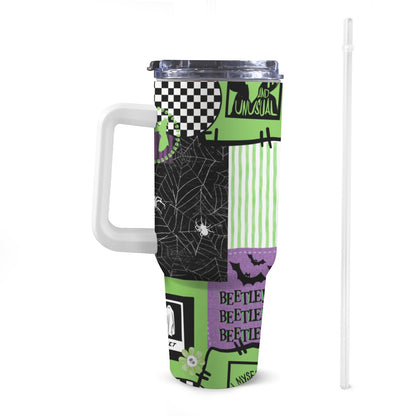 Front view of 40oz Beetlejuice Stanley-style tumbler with a white handle, featuring exclusive colourful patterns.