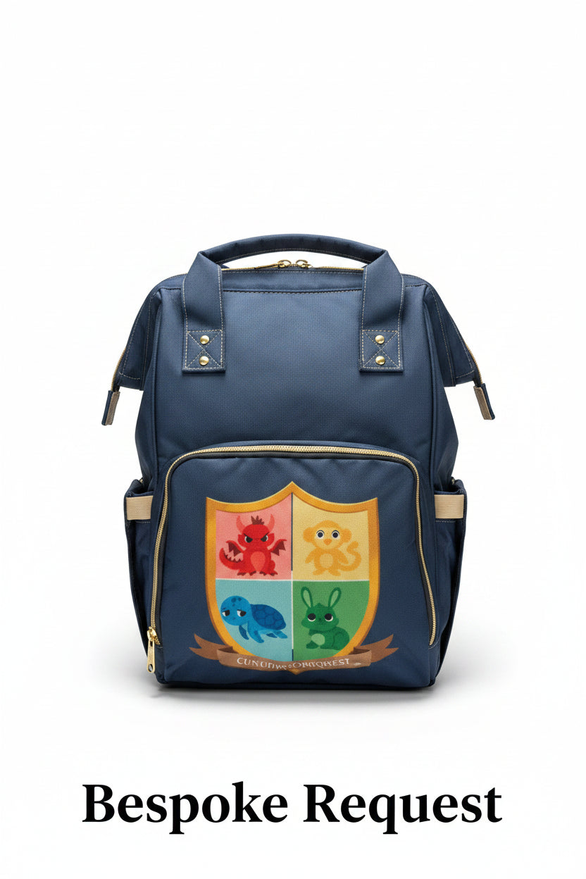 A navy blue diaper bag with a colorful shield graphic on the front pocket, resting on a white textured bedsheet.