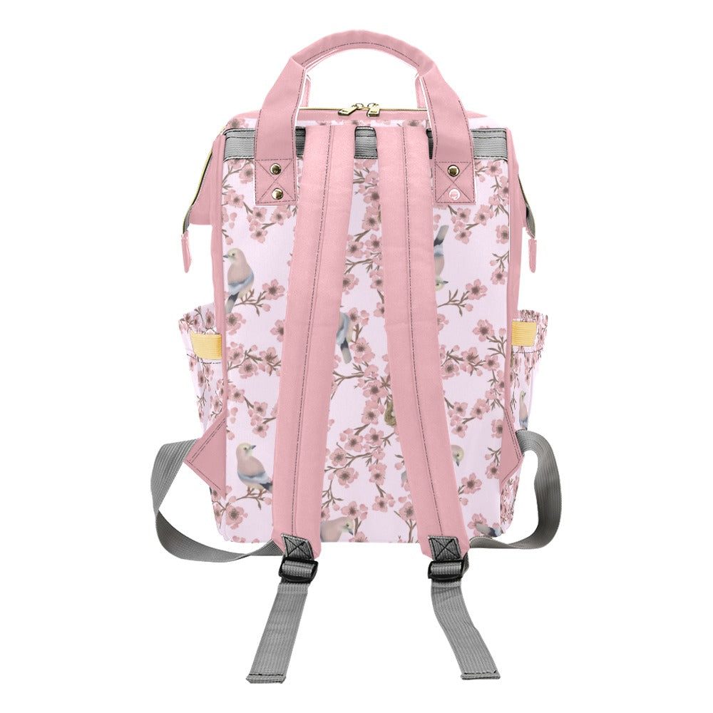 Backpack with cherry blossom and bird pattern on a white background