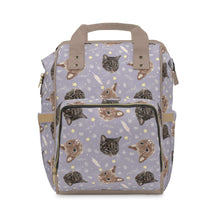 Carica l&#39;immagine nel visualizzatore di Gallery, Purple baby changing backpack with adorable cat and kitten illustrations.
