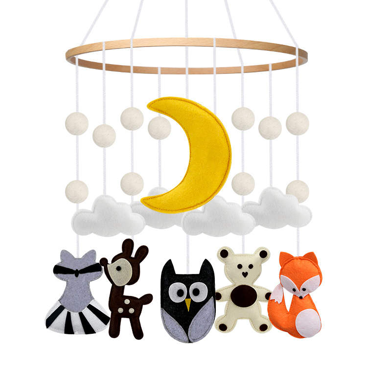 Woodland crib mobile gently swaying with soft felt animals and soothing colors, designed to captivate and engage babies