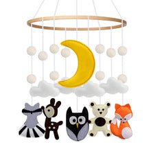 Load image into Gallery viewer, Woodland crib mobile gently swaying with soft felt animals and soothing colors, designed to captivate and engage babies
