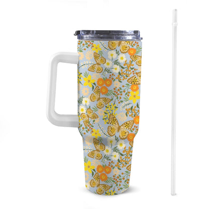 Front view of 40oz floral butterfly Stanley-style tumbler with a white handle, featuring exclusive colourful patterns