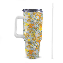 Load image into Gallery viewer, Front view of 40oz floral butterfly Stanley-style tumbler with a white handle, featuring exclusive colourful patterns
