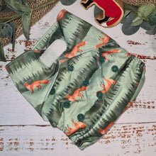 Load image into Gallery viewer, An image of cloth pocket nappies with hemp boosters neatly arranged on a flat surface. The nappies are made of soft, colorful fabric with elastic leg cuffs and snaps for adjustable sizing. The hemp boosters are slim inserts made from natural fibers, designed to enhance absorbency. This eco-friendly diapering option provides reusable and sustainable comfort for babies
