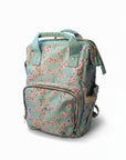 Floral-patterned backpack on a white surface