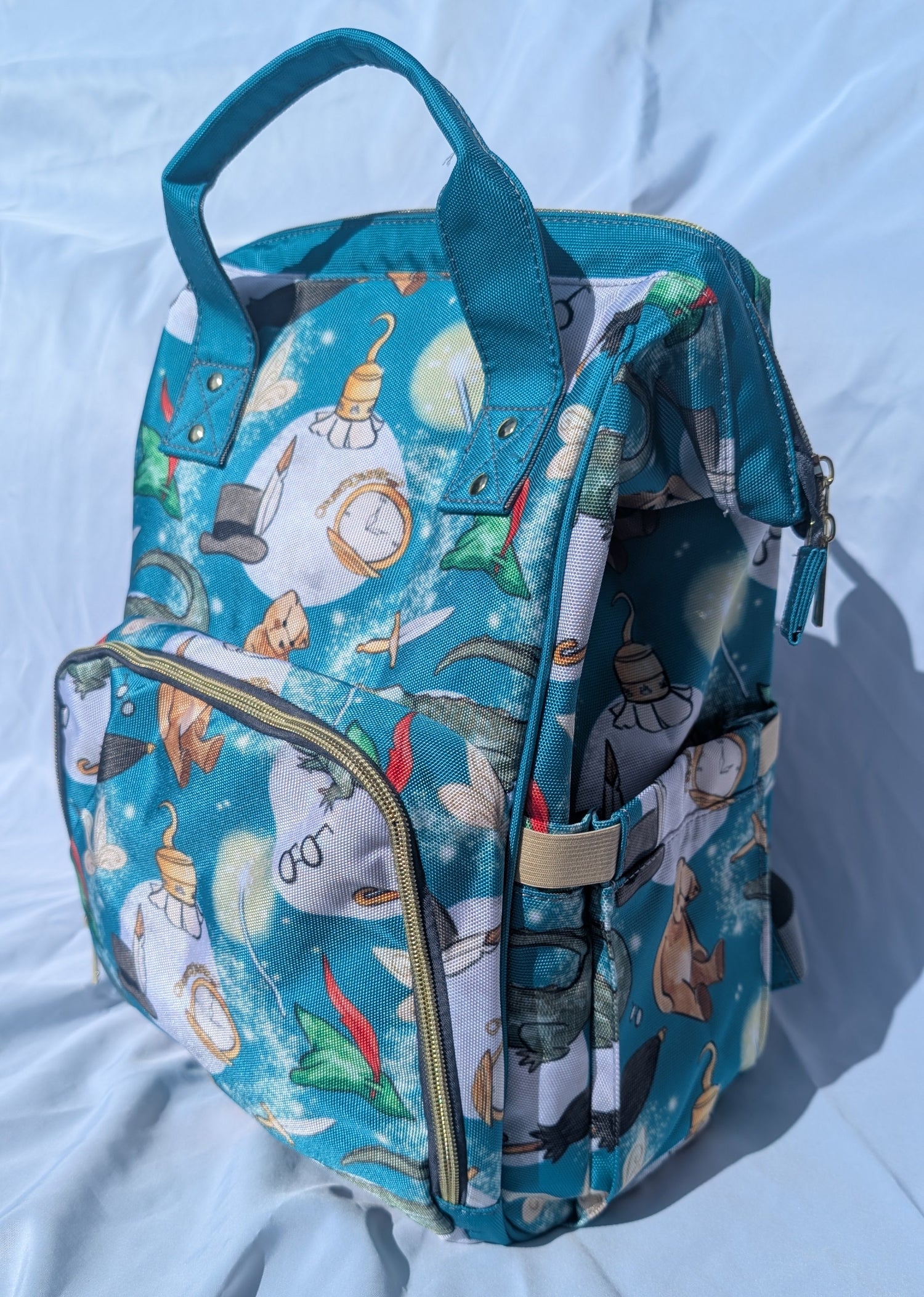 Colorful parents backpack with disney inspired design on a white background