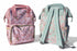 Two floral-patterned backpacks on grass