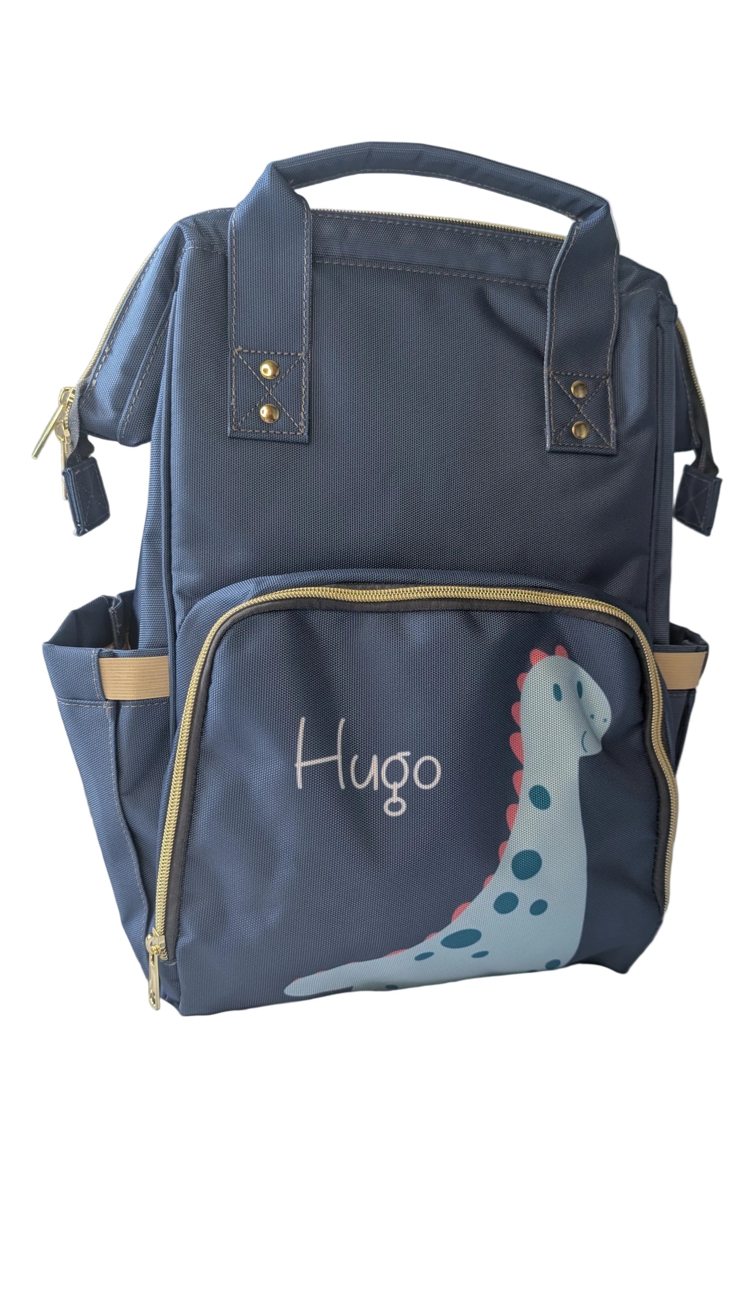 Navy blue backpack with a dinosaur design and 'Hugo' text on a white surface.