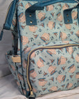 Diaper bag with nautical pattern on a white surface