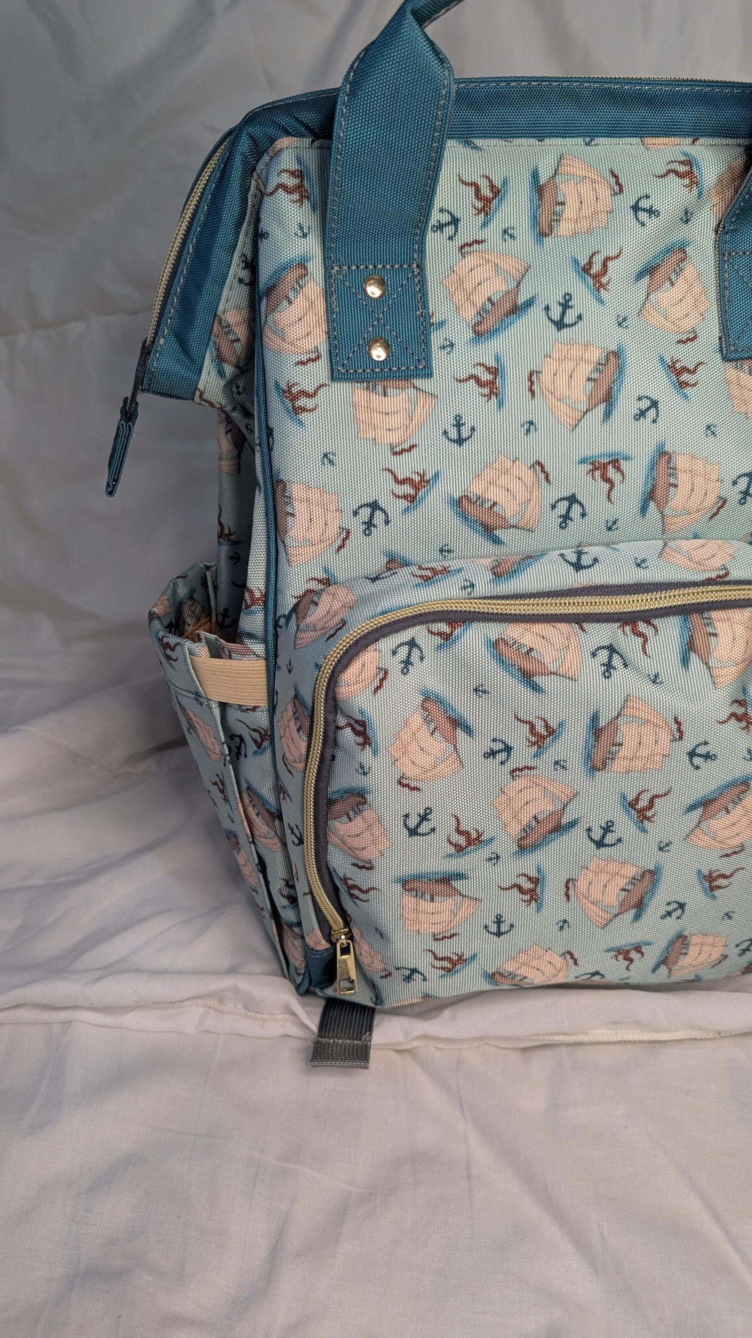 Backpack with a nautical pattern on a white background
