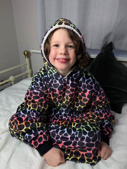 Child wears Green Cheeks Hooded Blanket