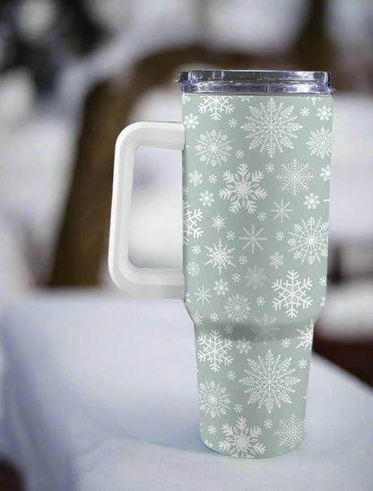 Front view of 40oz Christmas-themed Stanley-style tumbler featuring a cold, icey festive pattern.