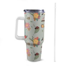 Load image into Gallery viewer, Front view of 40oz gardening Stanley-style tumbler with a white handle, featuring exclusive colourful patterns
