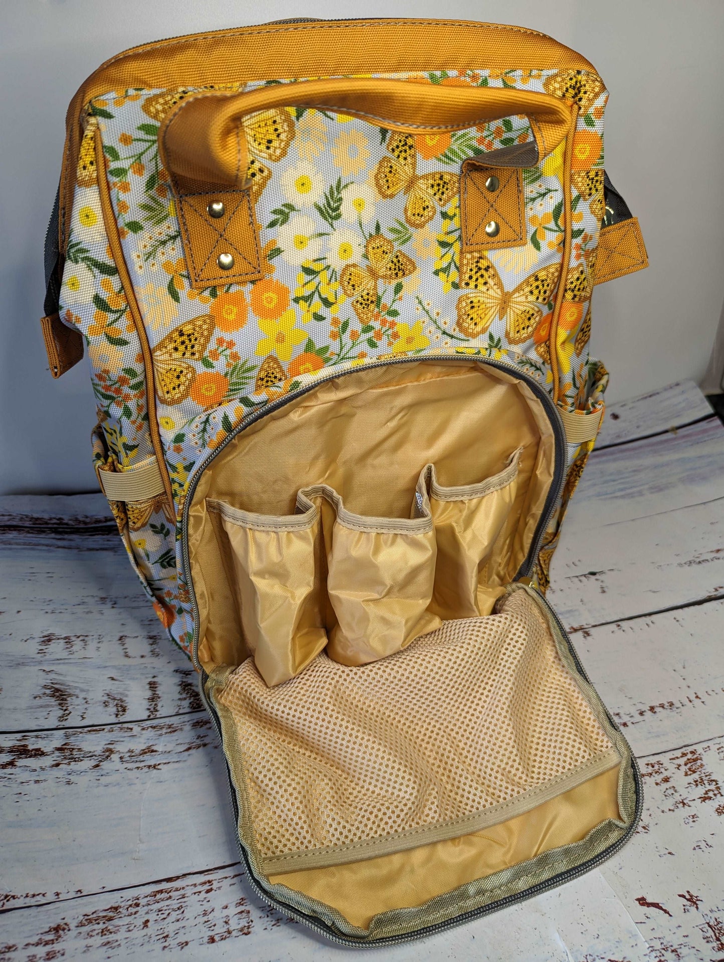 Butterfly Baby Changing Bag in Yellow & Orange