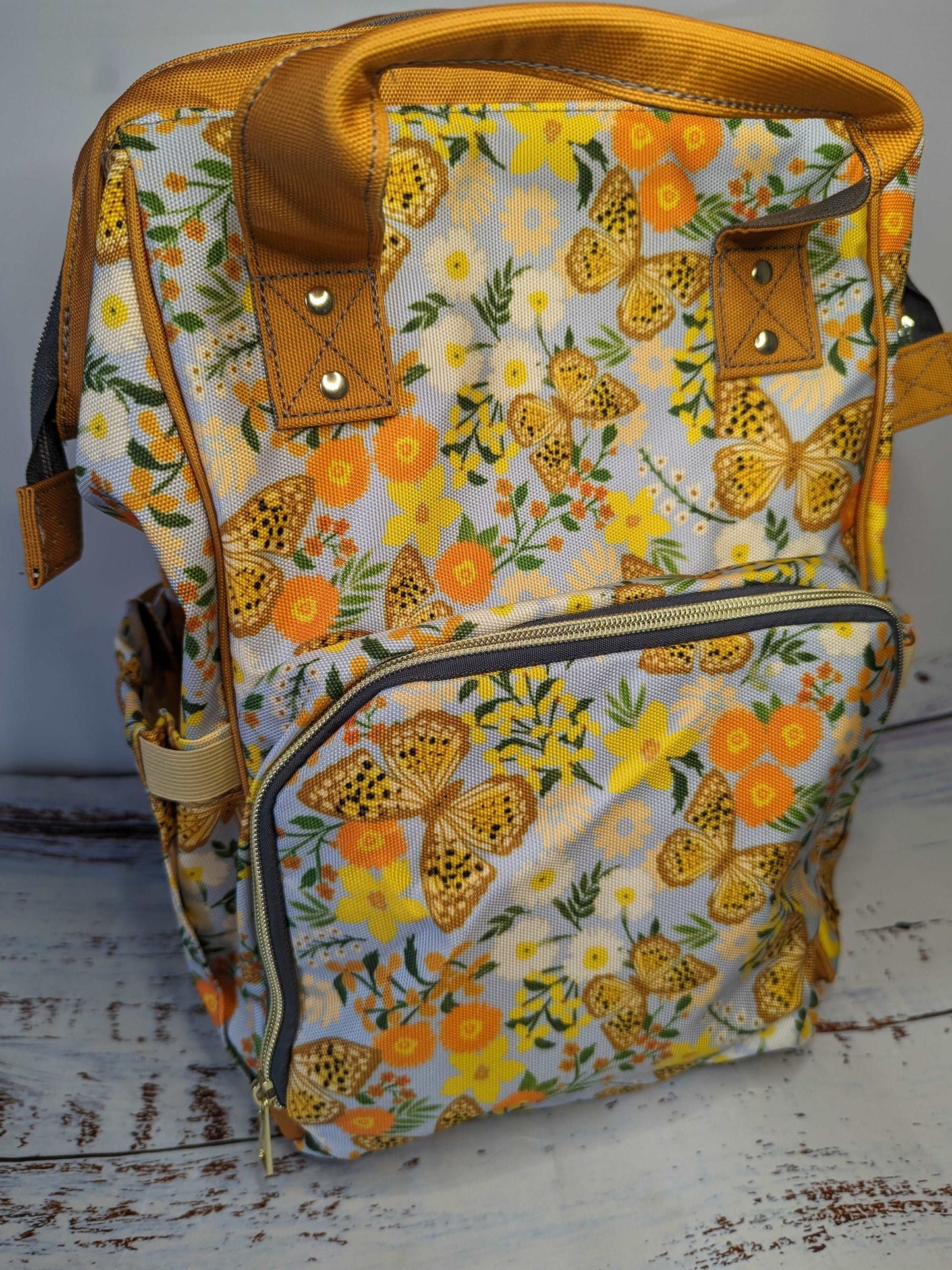 Butterfly Baby Changing Bag in Yellow & Orange