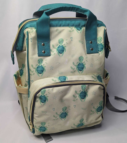 Lifestyle SHot of Green Cheeks Turtle Recall Changing Bag