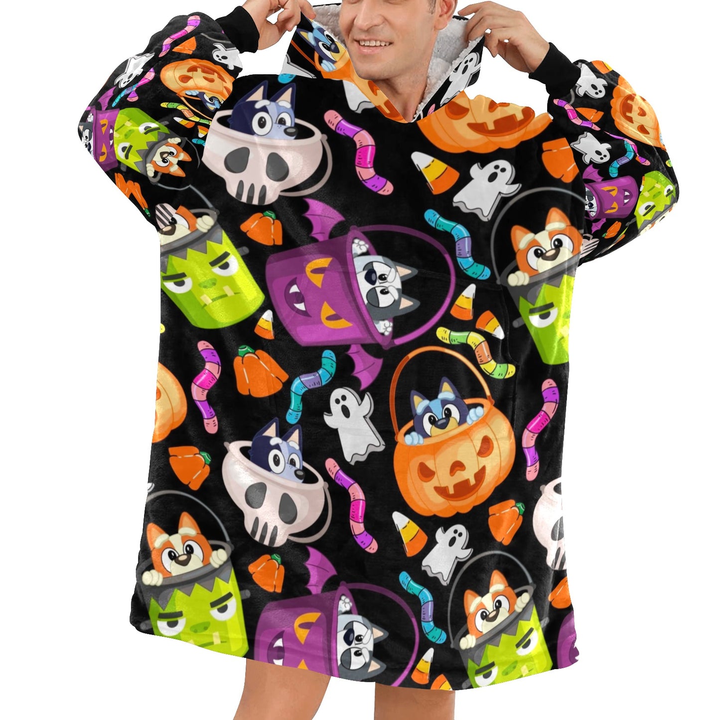 Man stands wearing a halloween fleece balnket