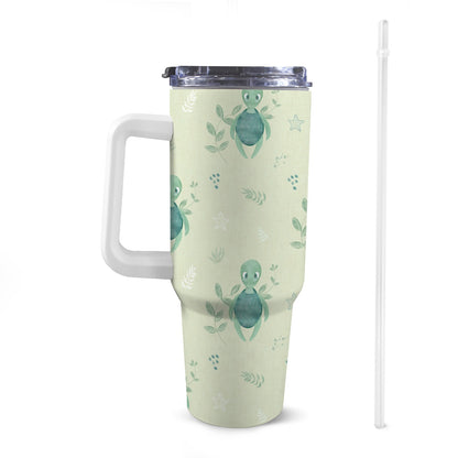 Front view of 40oz turtle tortoise Stanley-style tumbler with a white handle, featuring exclusive colourful patterns