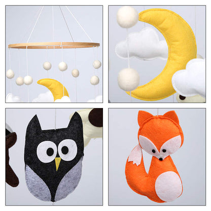 Close-up view of handcrafted woodland animals, including a fox, owl, deer, and bear, made from soft felt for the Woodland Baby Cot Mobile