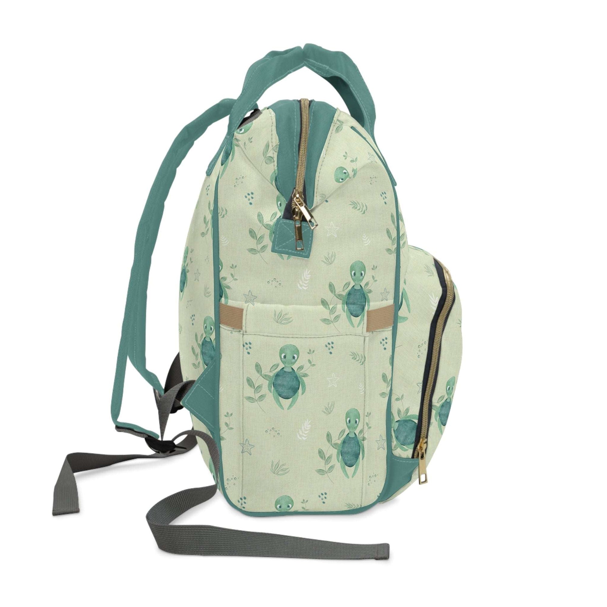 Green Baby Changing Backpack Bag - Turtle Recall - Green Cheeks - Diaper Bag