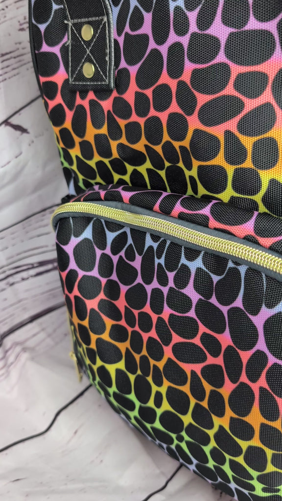 Look around the rainbow animal changing bag from green cheeks 