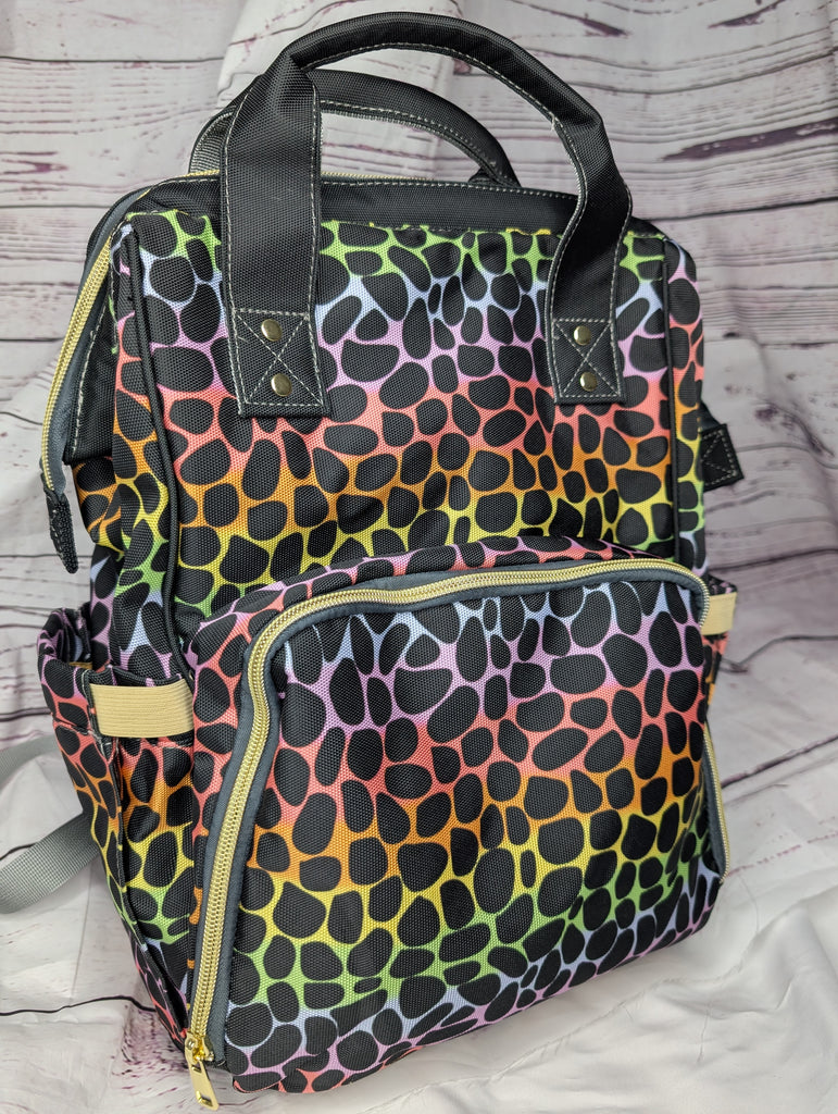 Peep inside the Rainbow Leopard print changing bag