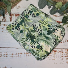 Load image into Gallery viewer, A photo of cloth pocket nappies featuring hemp boosters, showcasing an eco-friendly diapering choice with colorful, reusable fabrics
