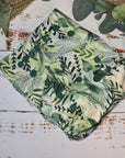 A photo of cloth pocket nappies featuring hemp boosters, showcasing an eco-friendly diapering choice with colorful, reusable fabrics