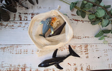 Load image into Gallery viewer, An eco conscious way to store bath toys in a cotton mesh bag
