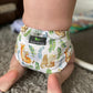 Happy family using cloth nappies, embracing a sustainable and environmentally friendly diapering choice