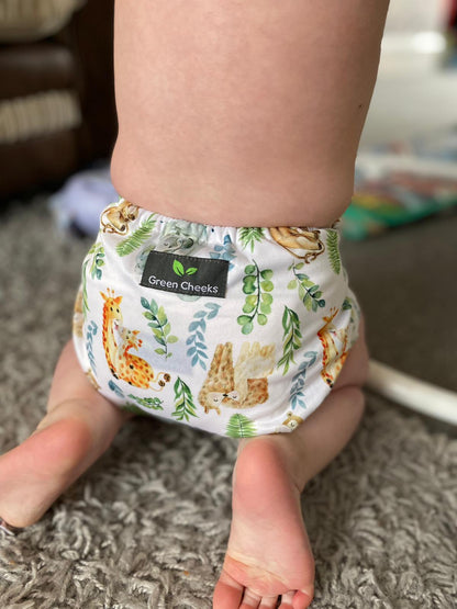 Happy family using cloth nappies, embracing a sustainable and environmentally friendly diapering choice